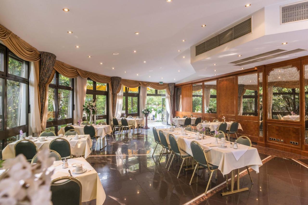 Hotel Am Schlosspark Исманинг Экстерьер фото